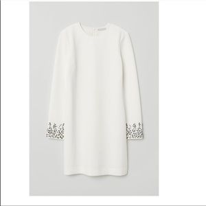 Dress with diamonds on the sleeve